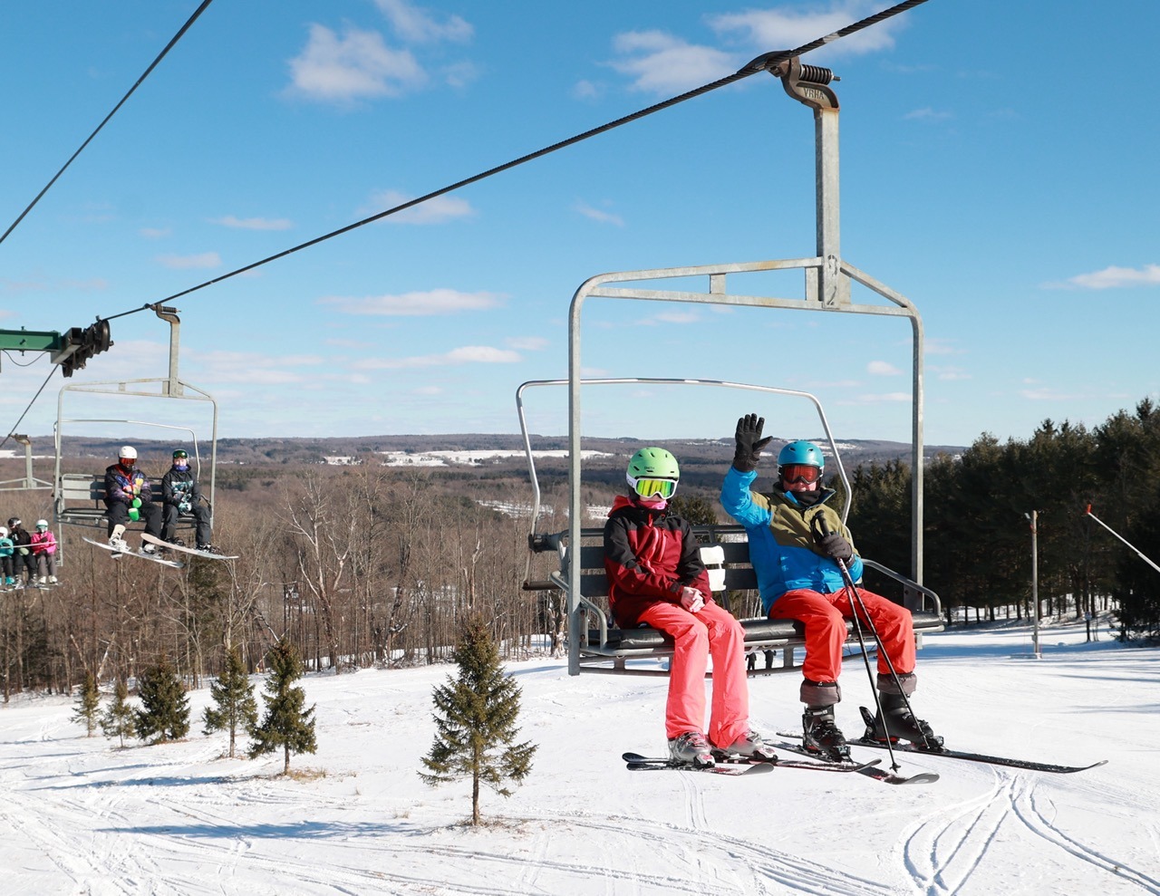 Skiers ride the Holly Quad lift at Kissing Bridge in Glenwood, NY, Monday, February 19, 2024.  Photo by Sharon Cantillon.